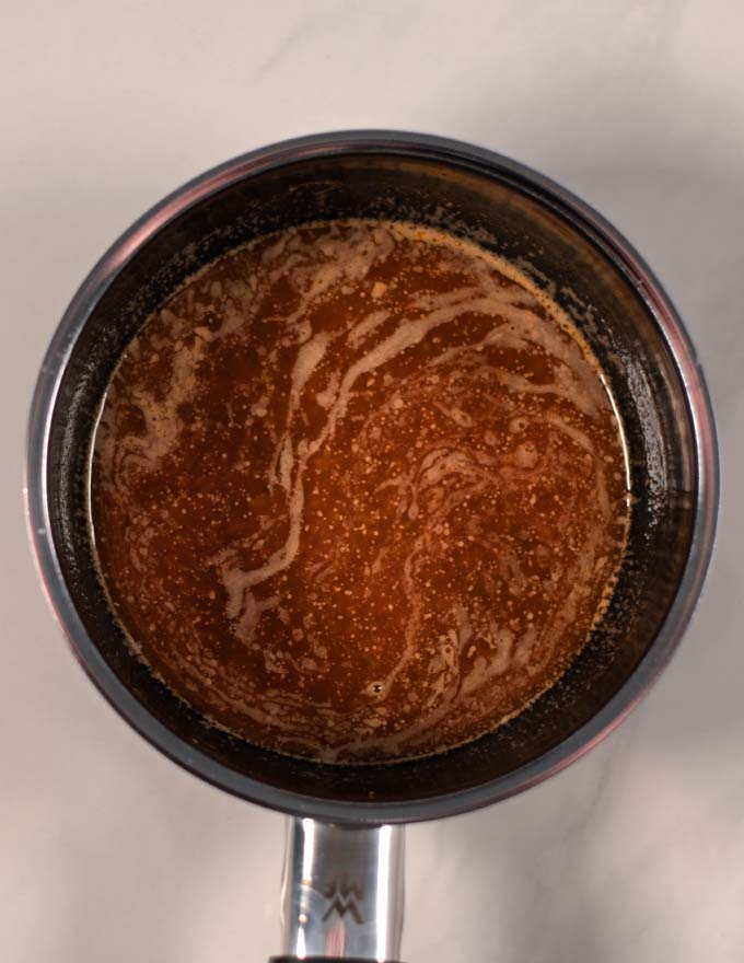 Ready sauce in a small saucepan.