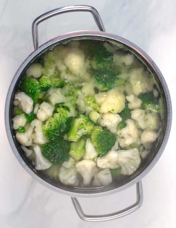 Broccoli and cauliflower are precooked in salt water.