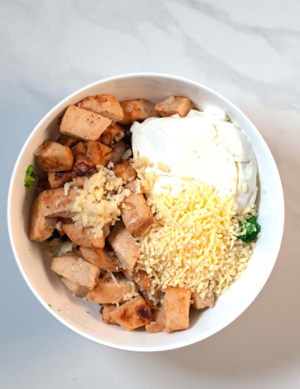 All ingrdients for the Keto Chicken Vegetable Casserole in a mixing bowl.
