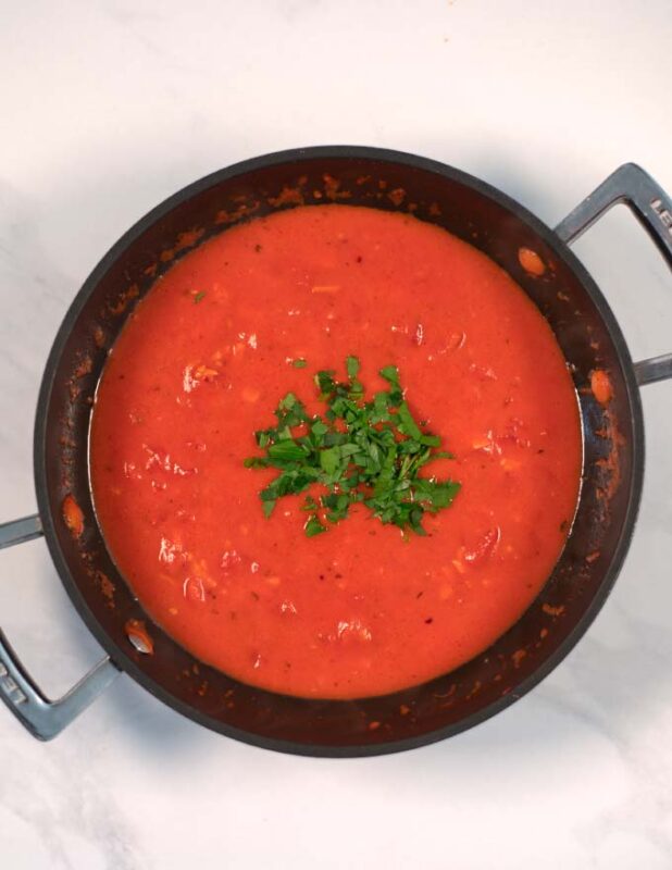 Dair-free cream and fresh parsley are mixed into the sauce base.