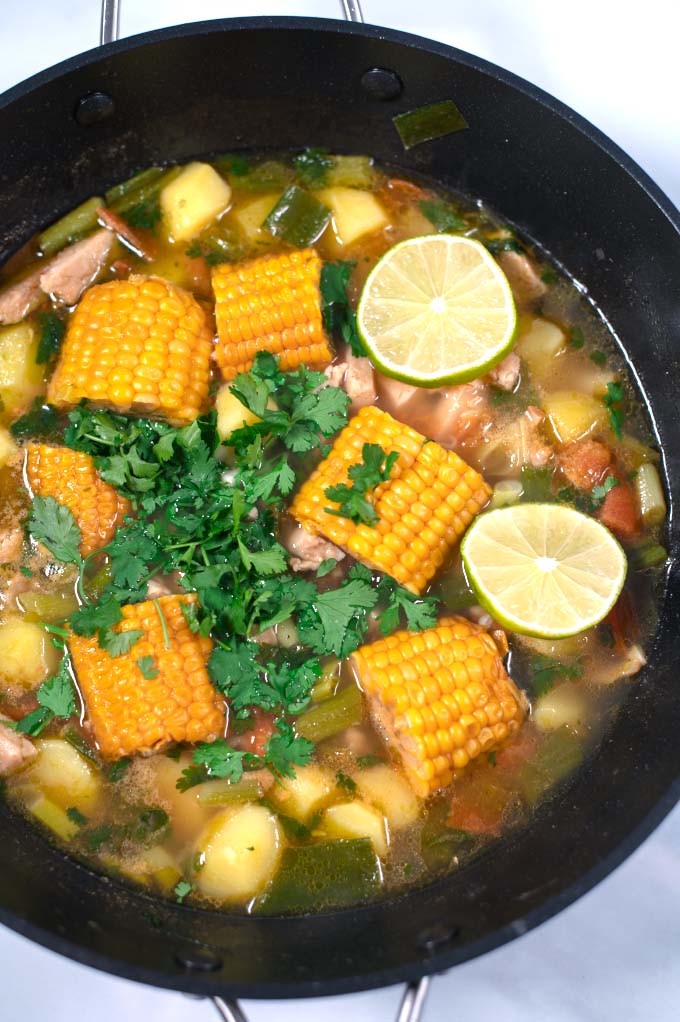 Lime juice give extra tang to Sancocho.