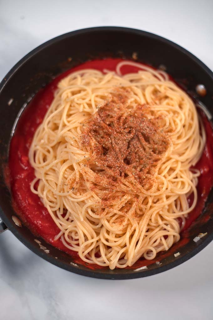 Closeup of a serving of pasta in a pan.