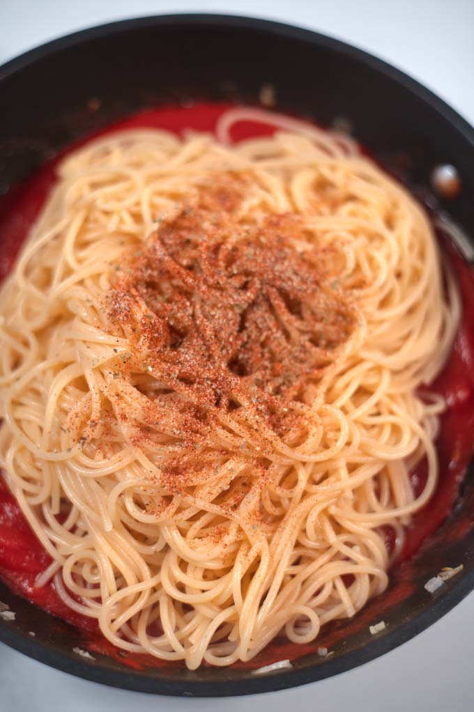 Spaghetti Seasoning is given over pasta.