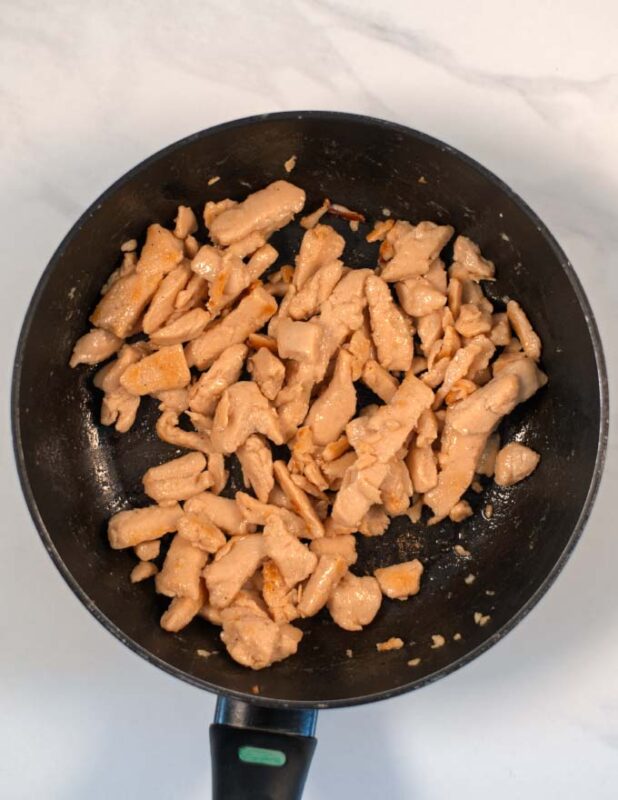 Vegan chicken is cooked in a pan.