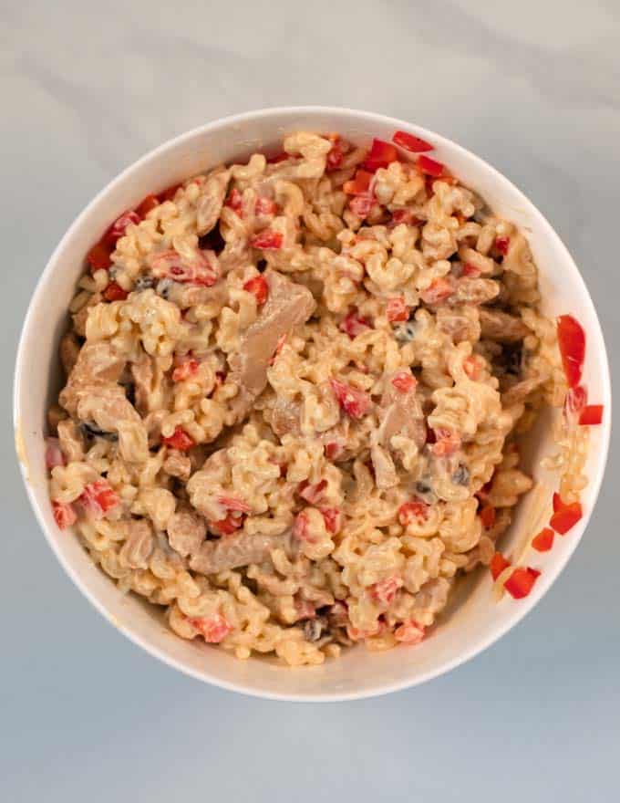 Combined Chicken Macaroni in a white bowl.