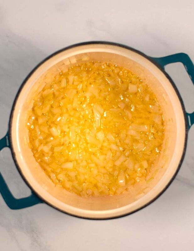 Finely diced onions are cooked in butter.