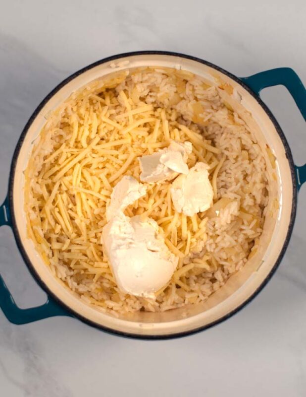 Sour cream and cheese are given to the rice mixture.