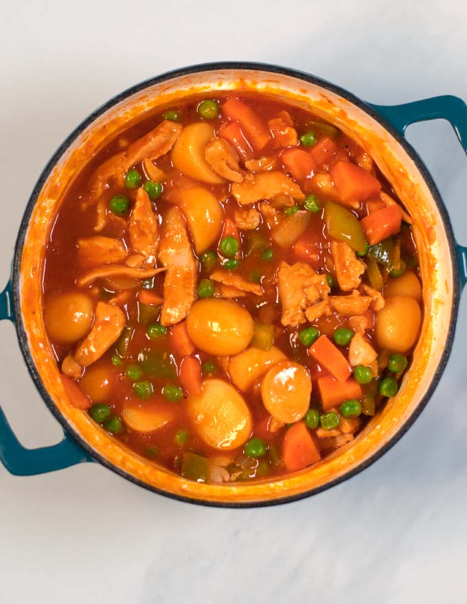 Ready Afritada Chicken in a pot.