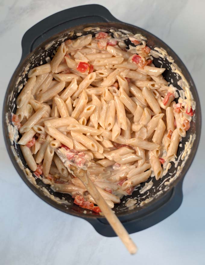 Mixed Haitian Mac and Cheese in a large mixing bowl.