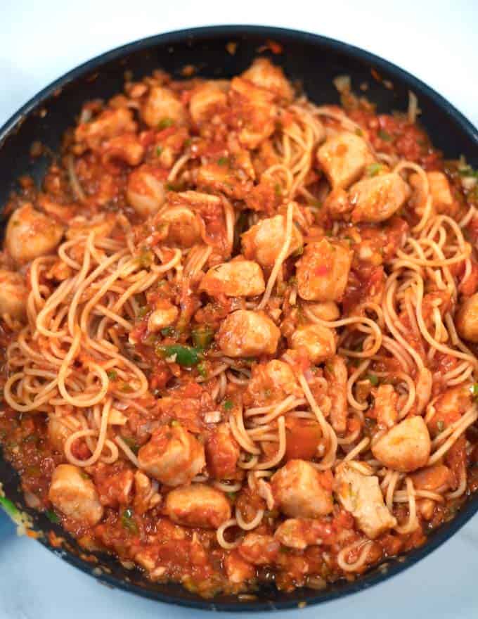 Fully mixed Jambalaya Pasta in a large frying pan ready for serving.