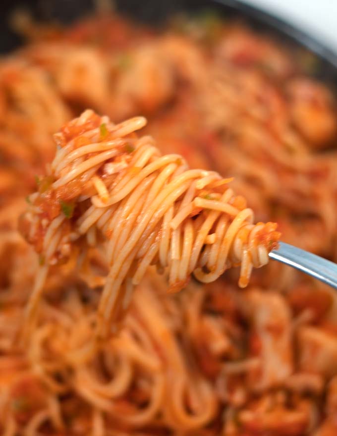 A fork full of Jambalaya Pasta.