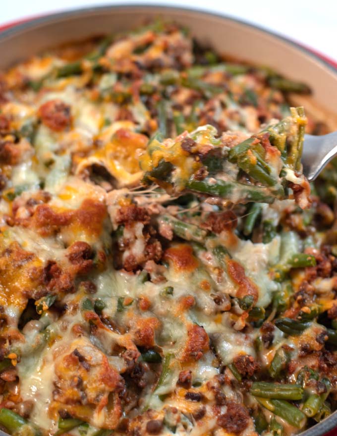 A fork with Green Bean Hamburger Casserole.