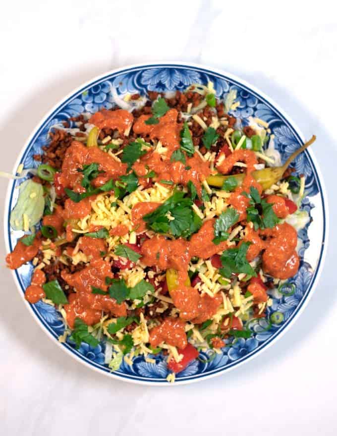 Keto Taco Salad topped with dressing/