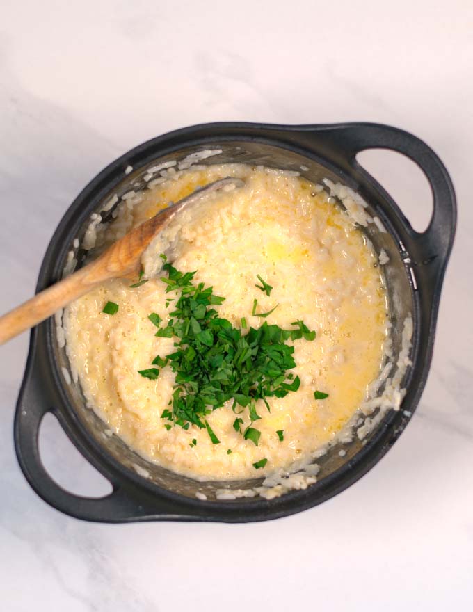 Fresh herbs are added to the Parmesan Rice.