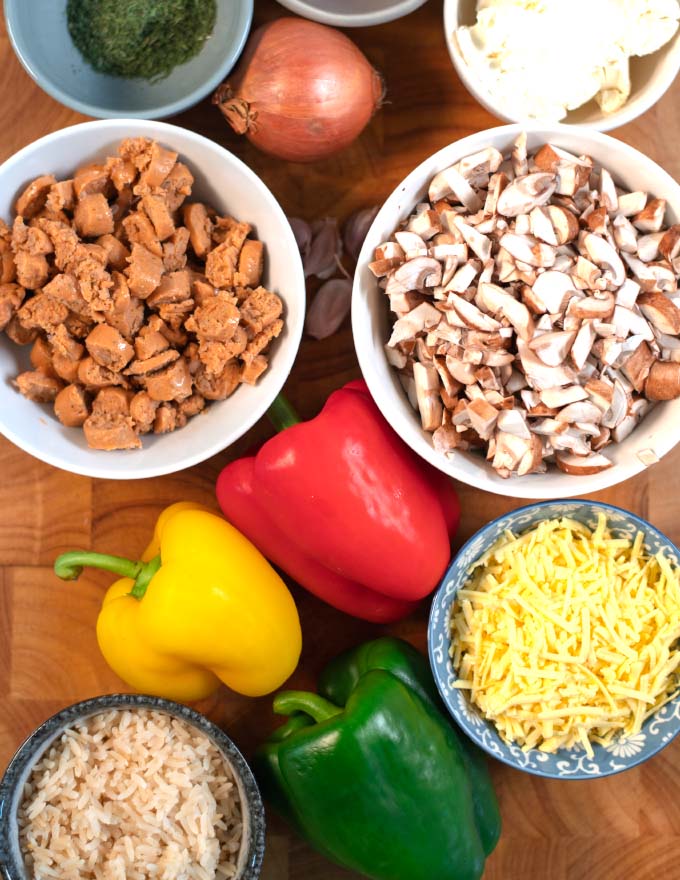 Ingredients needed to make Sausage Stuffed Peppers are collected on aboard before preparation.