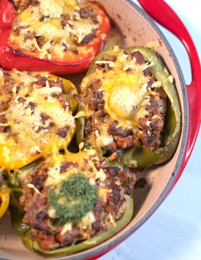 Vegan cheese is used as topping for the sausage stuffed peppers.