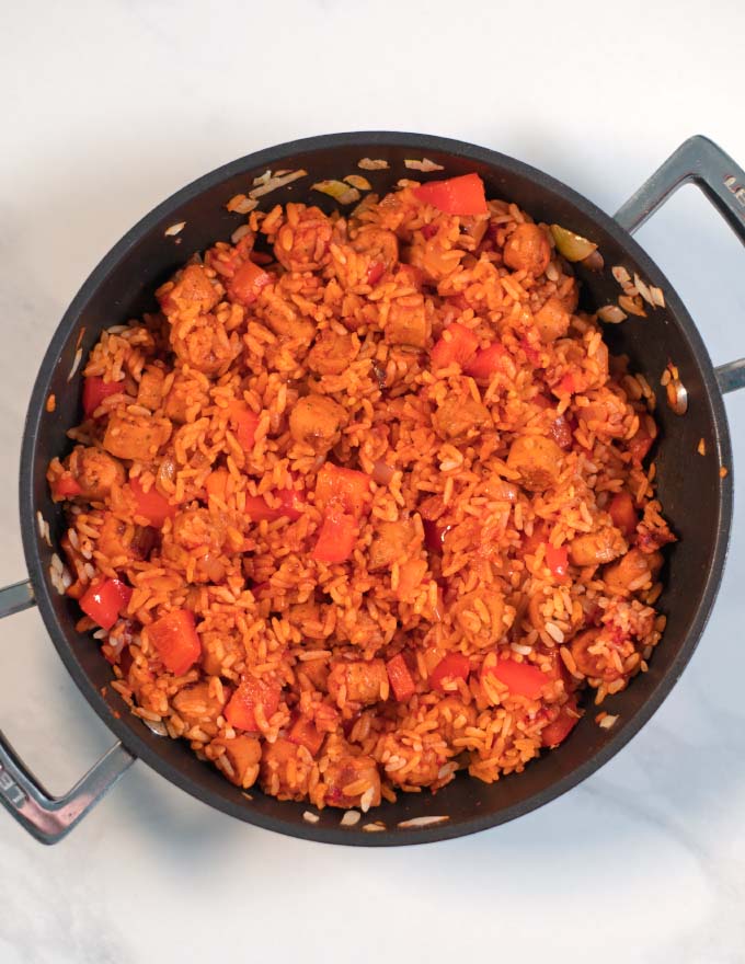 Rice has been added to the pan.