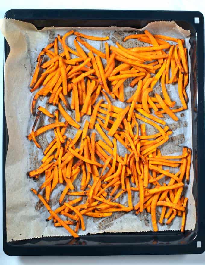 Crispy Sweet Potato Fries out of the oven after baking.