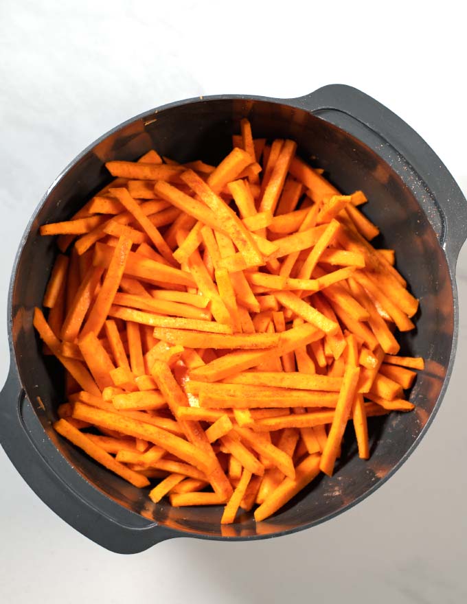 Coated sweet potato fries.