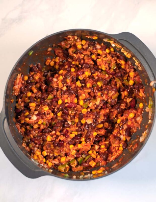 Mixed casserole ingredients in a mixing bowl.