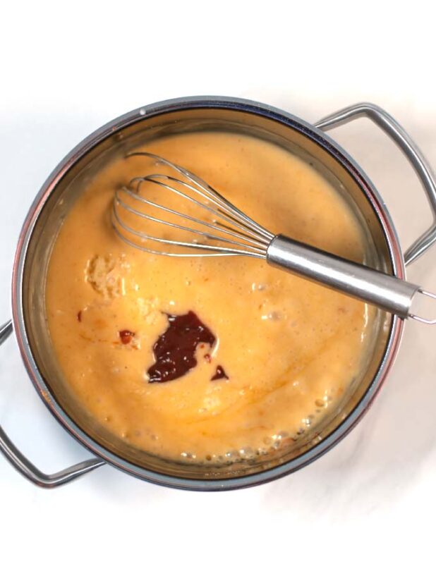 BBQ sauce is mixed with the white sauce.