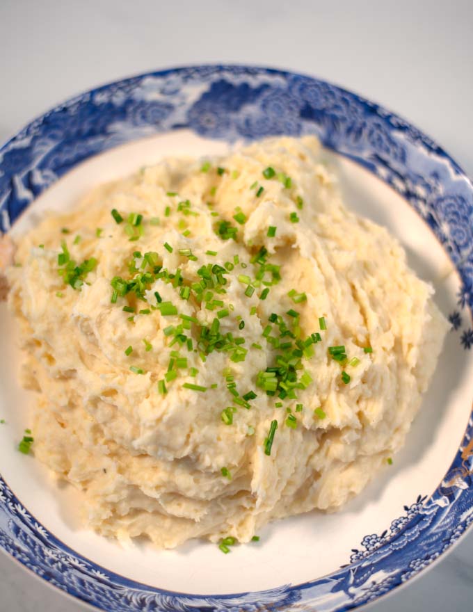 Closeup on a serving garnished with chives.