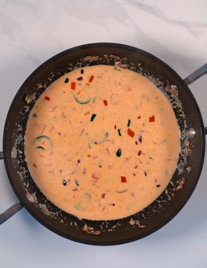 Creamy lime sauce for Coconut Lime Tofu in a pan.