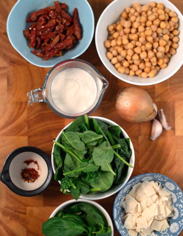Ingredients needed to make Marry Me Chickpeas are collected before preparation.