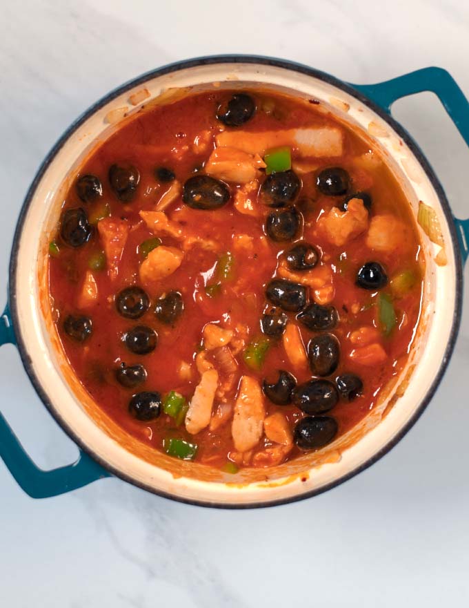 Tomato sauce is given to the Spanish Chicken Stew.