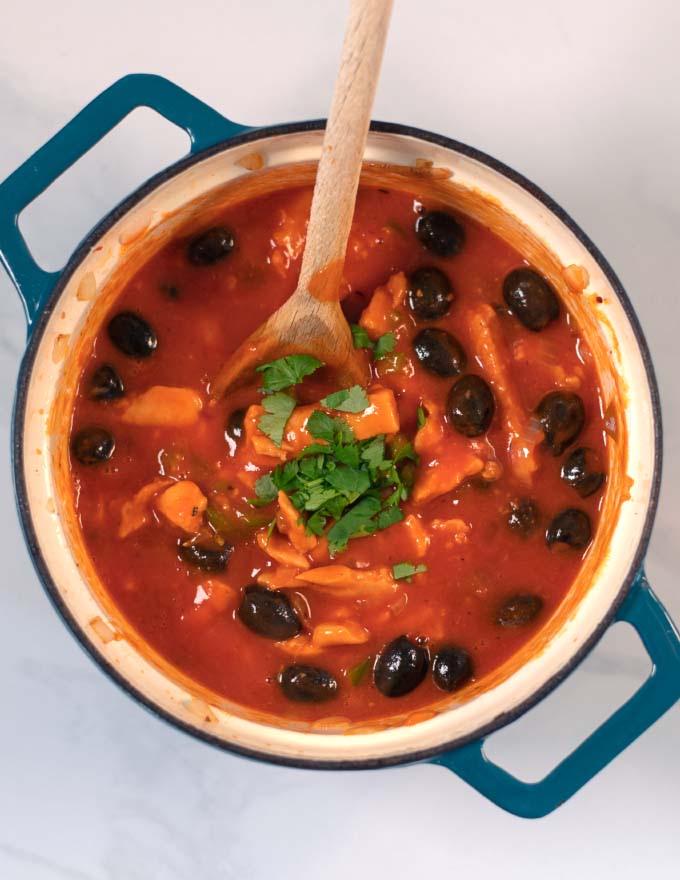 Fresh herbs garnish the Spanish Chicken Stew.