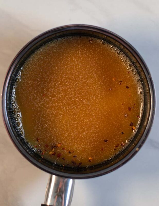 Liquid ingredients in a pot.