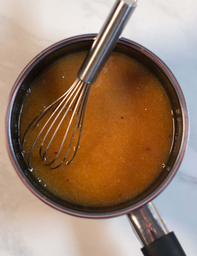 Ready Chinese Orange Sauce in a small saucepan.