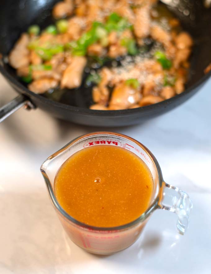 Closeup of Chinese Orange Sauce in a jar.