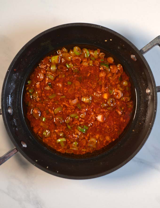 Ready Szechuan sauce in a pan.