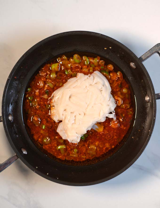 Chinese Noodles are added to the Szechuan Sauce.