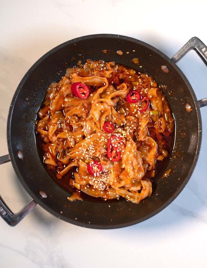 Top view of a pan with Szechuan Noodles.