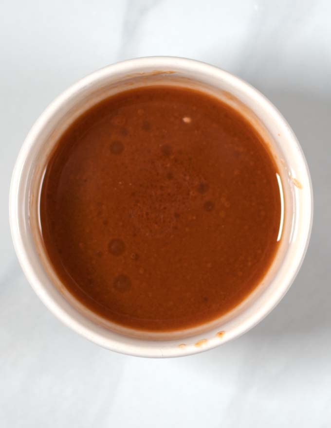 Smmoth Miso sauce in a white bowl.