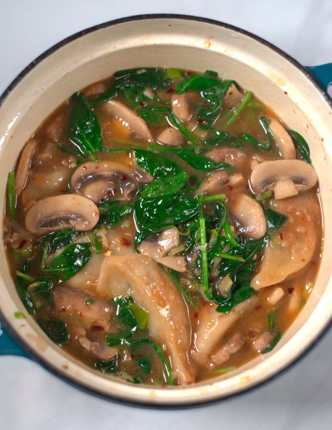 Closeup of a pot with Potsticker Soup.