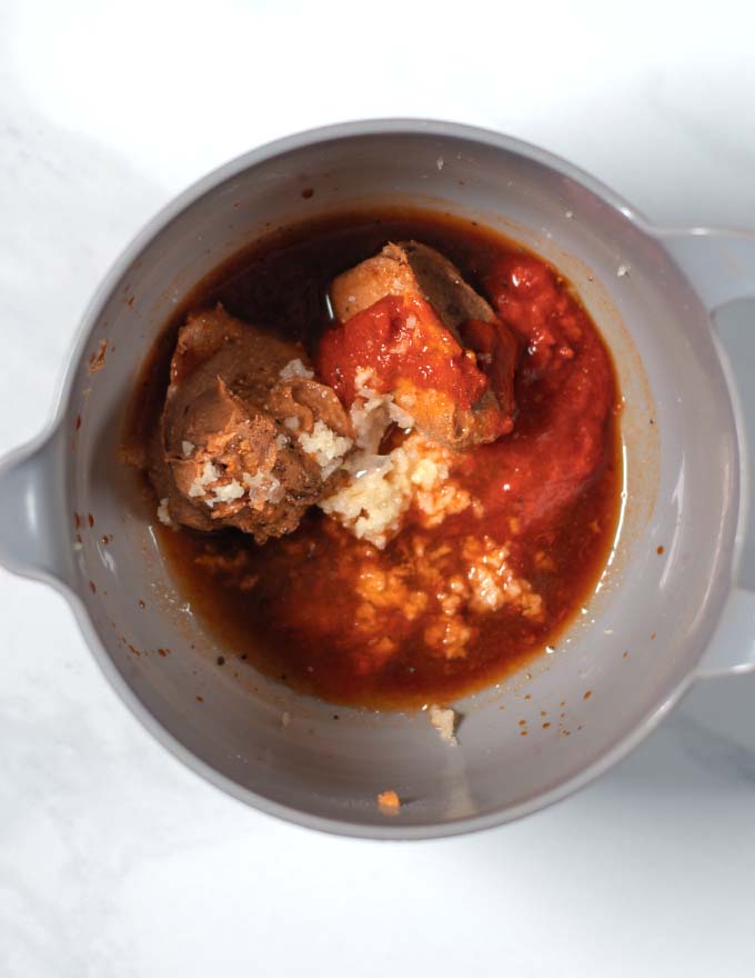 Ingredients for the peanut-lime dressing are given into a mixing bowl.