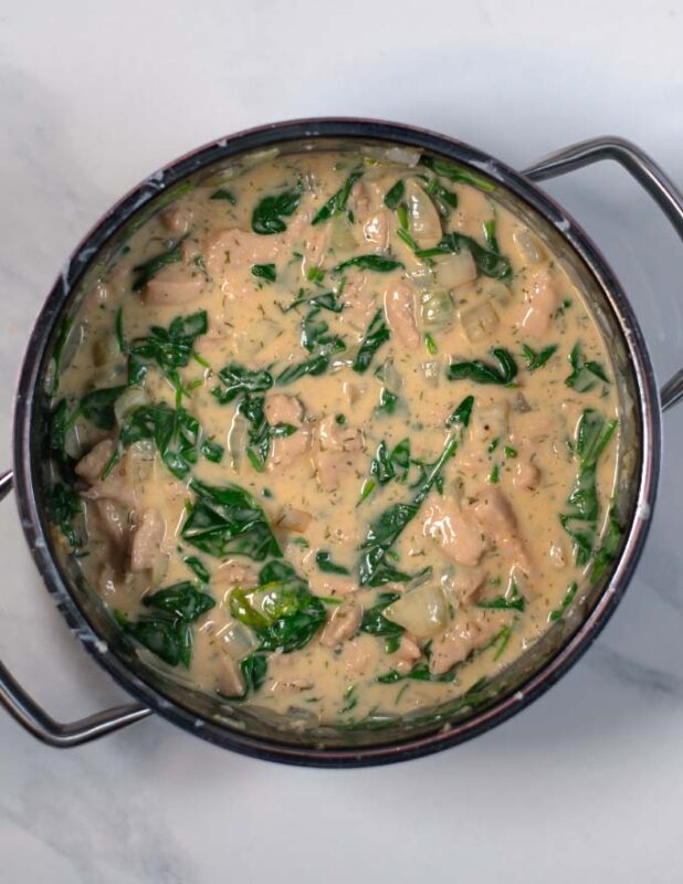 Fresh spinach is added to the Crack Chicken Soup.