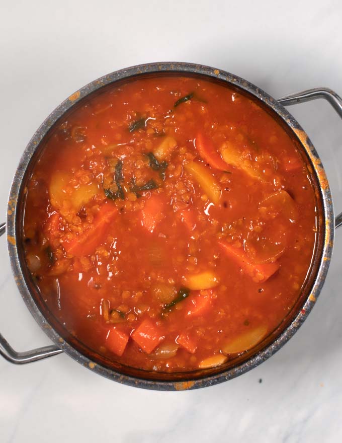 Cooked Turkish Lentil Soup in a pot before blending.